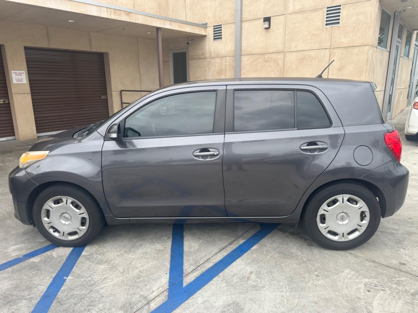 2009 Gray /Black Scion xD 5-Door (JTKKU104X9J) with an 1.8L L4 DOHC16V engine, automatic transmission, located at 30 S. Berkeley Avenue, Pasadena, CA, 91107, (626) 248-7567, 34.145447, -118.109398 - The 2009 Scion XD 4-Door Hatchback is a compact, versatile, and stylish vehicle that offers an exceptional driving experience. Located in the heart of Pasadena, CA, our dealership specializes in a comprehensive selection of used BHPH (Buy Here Pay Here) cars, including the dynamic Scion XD. This veh - Photo #1